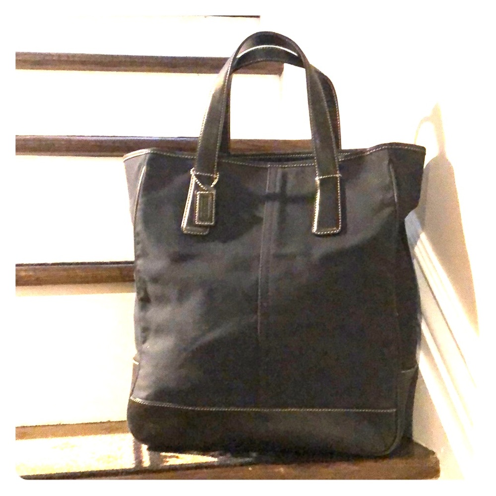 Coach, black canvas, brown leather tote.